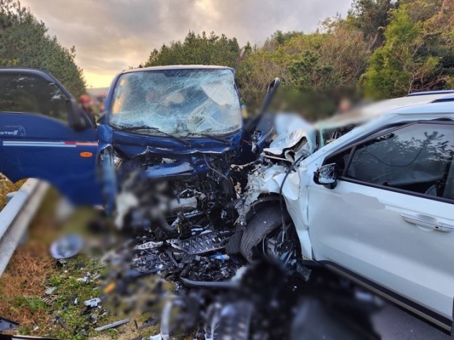 A 1-ton truck and a rental minivan are severely damaged from a car crash that happened in Jeju Island on Tuesday. (Jeju Fire Safety Headquarters)