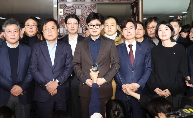 The ruling People Power Party Han Dong-hoon (front, 3rd from left) speaks in the National Assembly main building on Wednesday. (Yonhap)