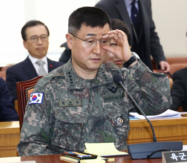 Park An-su, Chief of Staff of the Army and former martial law commander, attends a National Defense Committee meeting at the National Assembly in Yeouido, Seoul, on Thursday. (Yonhap)