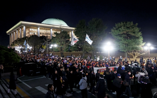 A rally calling for the resignation of the Yoon Suk Yeol administration is held at the National Assembly in Seoul on Wednesday. (Yonhap)