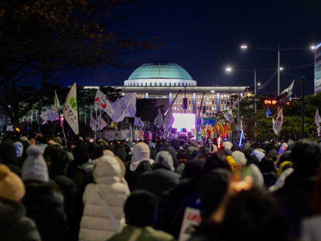 Protesters hold a massive rally near the National Assembly in Seoul, South Korea on Saturday, calling for President Yoon Suk Yeol's ouster after his martial law attempt. Yoon survived an impeachment vote on Saturday night. (UPI)