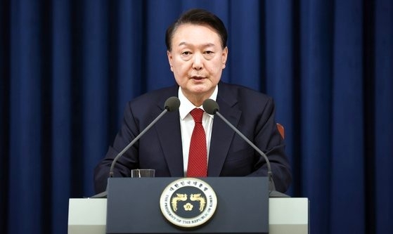 President Yoon Suk Yeol declares martial law during an emergency special address to the nation at the presidential office in Yongsan, Seoul, Tuesday night. (Presidential office)