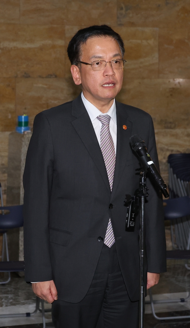 Finance Minister Choi Sang-mok talks to reporters at the National Assembly in Seoul on Dec. 10, 2024. (Yonhap)