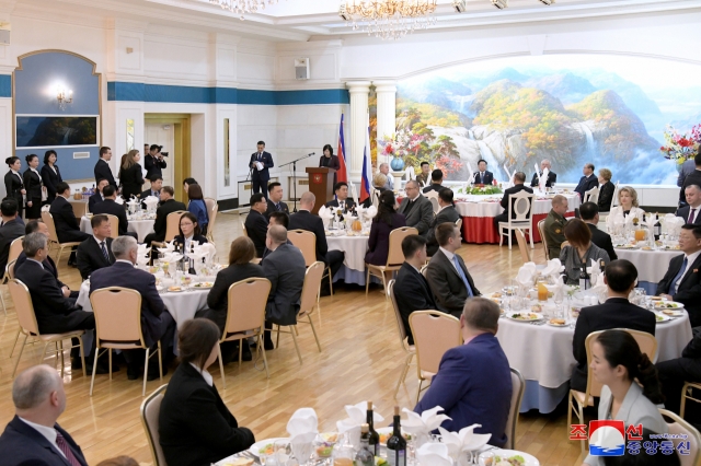 This photo shows a reception celebrating the ratification of a mutual defense treaty between Pyongyang and Moscow. The news agency reported the reception was hosted by the Russian Embassy in North Korea on Tuesday. (KCNA)