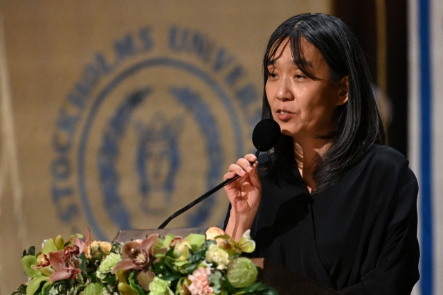 Nobel Prize in literature laureate, South Korean writer Han Kang, delivers a speech during the Nobel Prize banquet at the City Hall in Stockholm on Tuesday. (AFP-Yonhap)