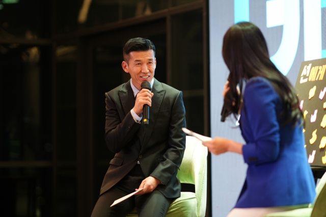 Sean of hip-hop duo Jinusean speaks at the Global Biz Forum hosted by The Korea Herald at the Ambassador Seoul -- a Pullman Hotel on Wednesday. (The Korea Herald)