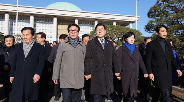 Lawmakers are heading to greet participants at a rally near the National Assembly in western Seoul, calling for the impeachment of President Yoon Suk Yeol, just hours before the second impeachment vote scheduled for 4 p.m. (Yonhap)