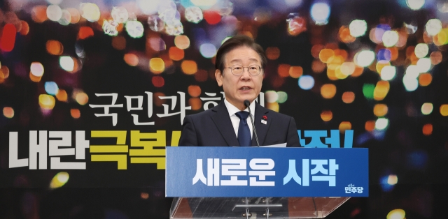 Democratic Party of Korea leader Rep. Lee Jae-myung speaks during a press conference held a day after the National Assembly voted to impeach President Yoon Suk Yeol. (Yonhap)