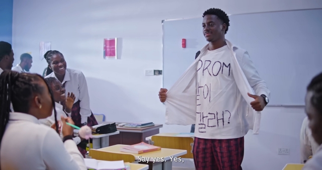 Played by Kemi Ikuseedun, Daniel, a classmate with a crush on Charis Benson, surprises everyone by asking her to prom with a dramatic reveal of his T-shirt, which reads “Will you go to prom with me?” -- catching both Charis and her crush Gerald off guard. (YouTube)