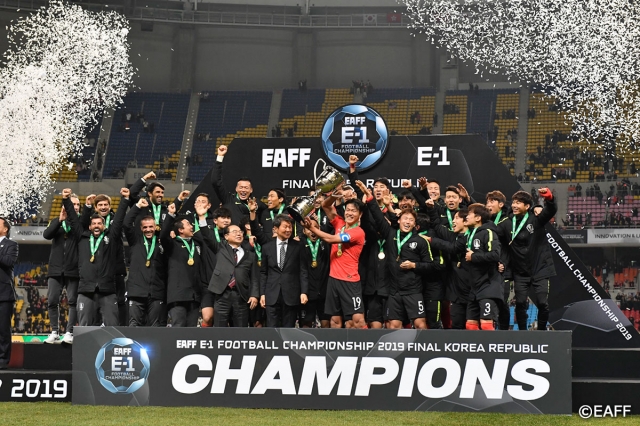 In this file photo from Dec. 18, 2019, South Korean players celebrate after winning the East Asian Football Federation E-1 Football Championship with a 1-0 win over Japan at Busan Asiad Main Stadium in Busan, about 325 kilometers southeast of Seoul. (Yonhap)