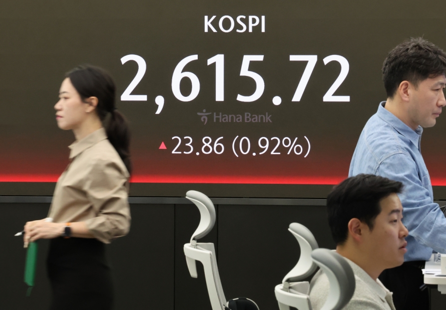 Seoul shares open higher on financial, bio gains