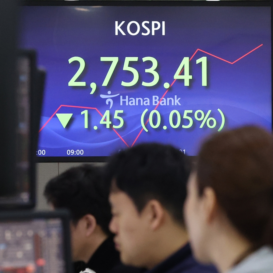 Seoul shares open nearly flat on profit taking