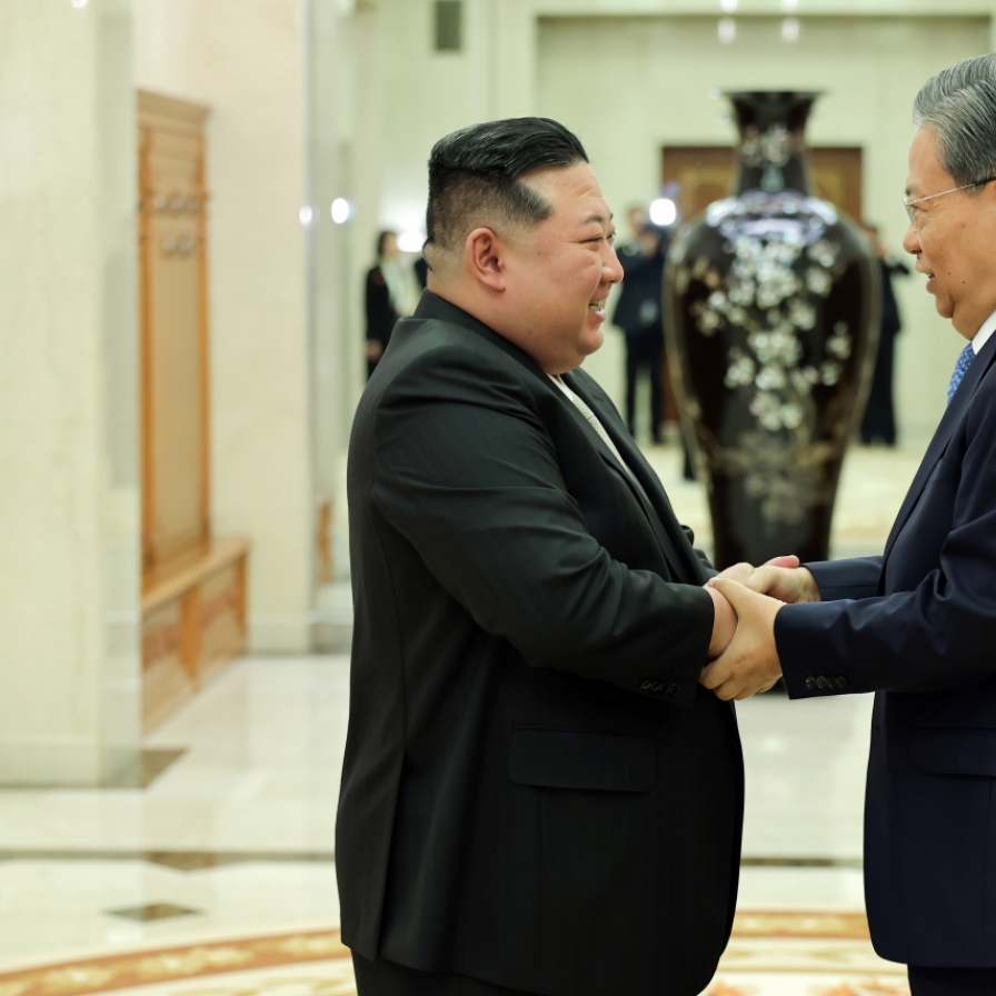 N. Korea's Kim vows to further develop ties with China