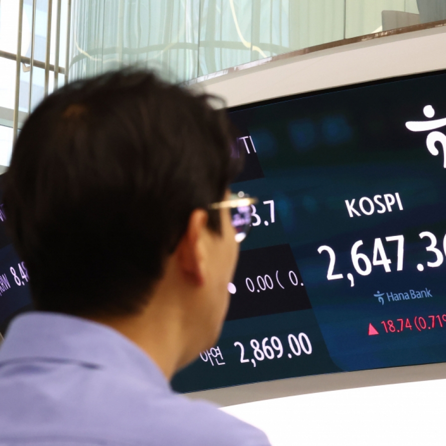 Seoul shares open higher on tech, financial gains
