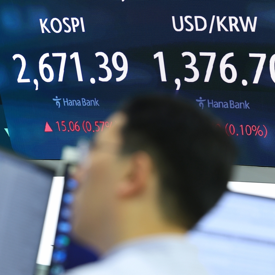 Seoul shares open higher on large cap gains