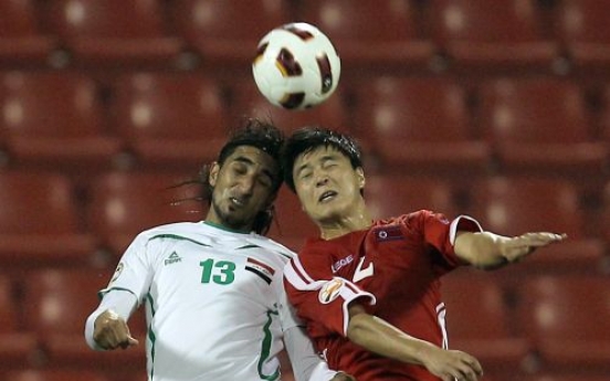 Iraq trips N. Korea to reach quarters