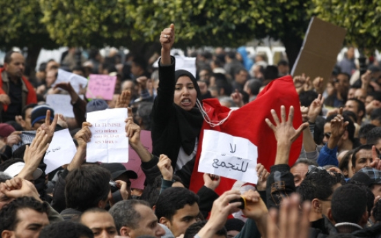 Tunisian leader vows ‘break’ with old regime