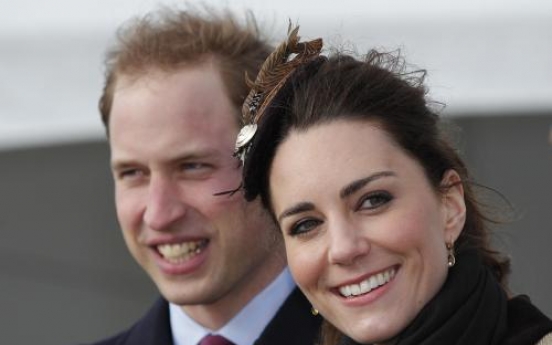 Bubbly Kate and William launch lifeboat before wedding