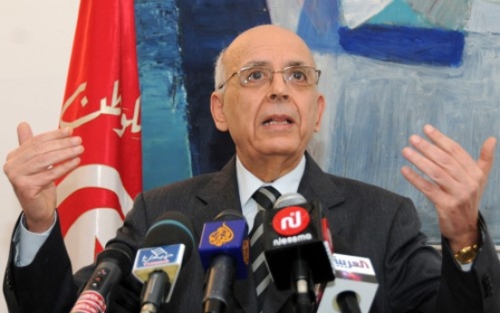 Tunisia gets new premier after new violence