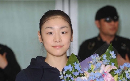 Kim Yu-na returns home