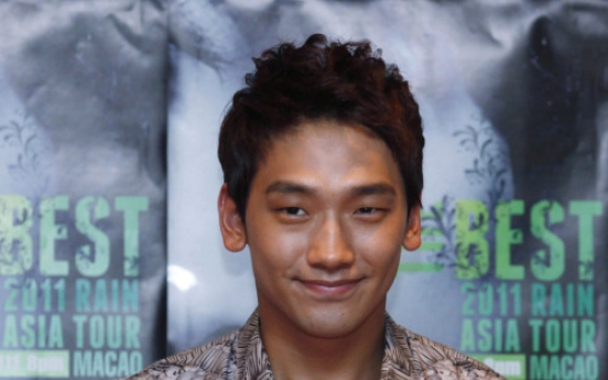 Rain talks music and movies, but not military duty