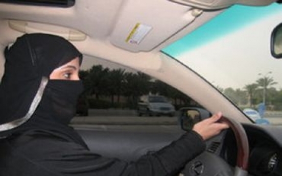 Saudi woman defies driving ban