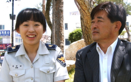 Daughter follows father’s footsteps, joins police force