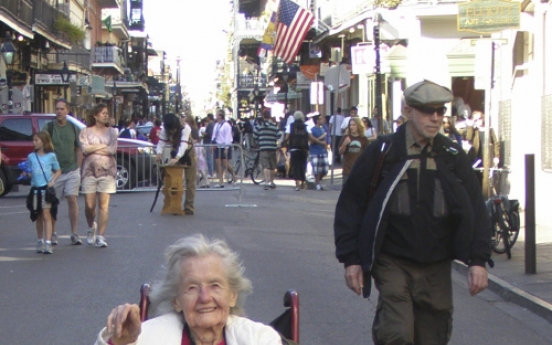 Elderly woman has to remove diaper for pat-down