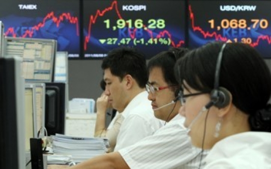 Seoul shares tumble on U.S. debt rate cut