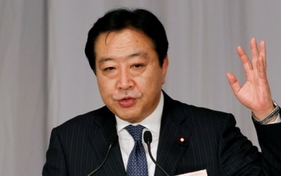 Finance minister wins Japan party vote, to be P.M.