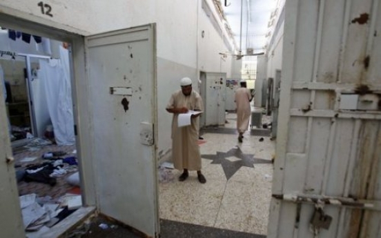 Liberated inmates tell of 'dark age' under Gadhafi