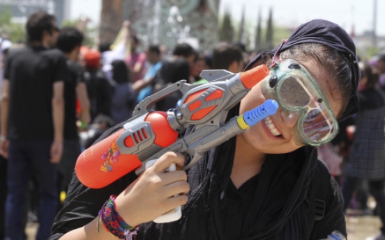 Water gun fight in a park? Iran sees dark designs