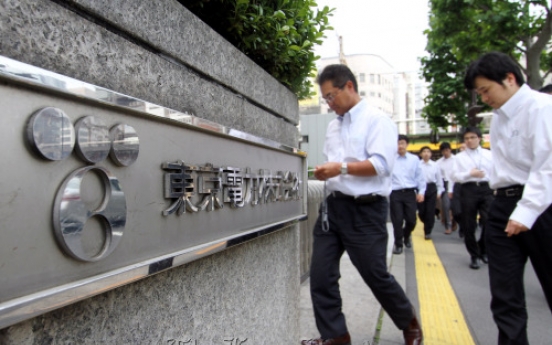 Japan panel eyes 7,400 job cuts at TEPCO