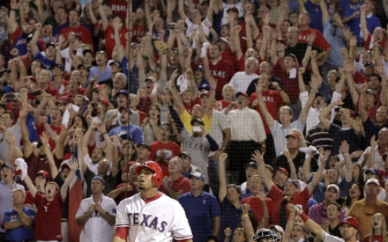 Cruz’s slam in 11th lifts Texas