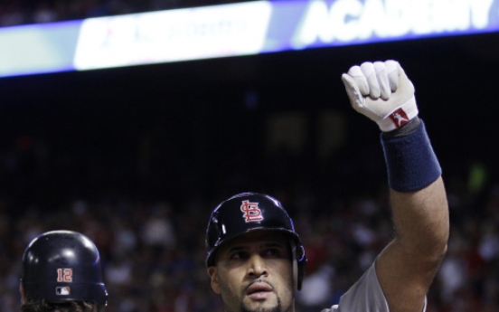 Pujols buries Rangers with three homers