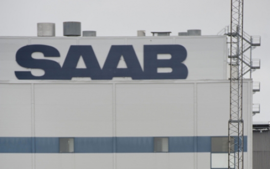 GM could cut business with Saab