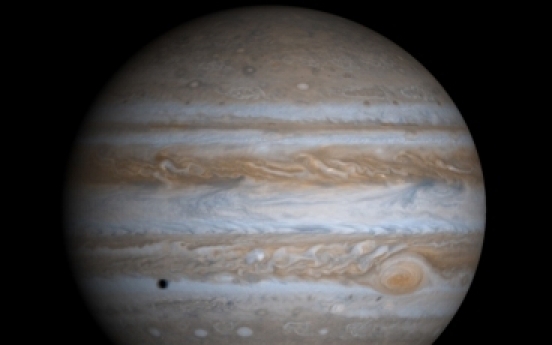 Massive lakes could lie beneath ice of Jupiter moon