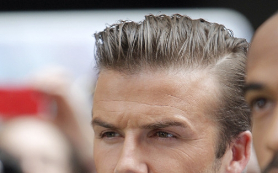 Beckham blasts Blatter over racism remarks