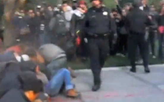 Passive Occupy protesters take pepper spray blast