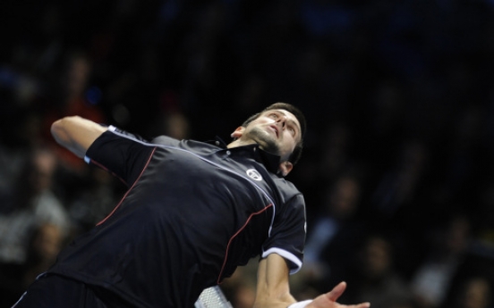 Ferrer stuns tired Djokovic at ATP Finals