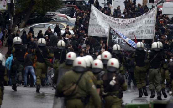 Greece passes austerity budget after clashes