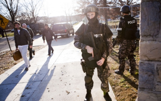 Virginia Tech gunman kills officer, later found dead