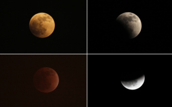 Sky-watchers get rare treat: total lunar eclipse