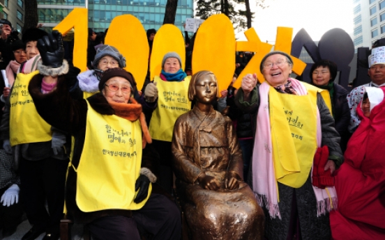 Sex slavery victims set up monument at 1,000th rally