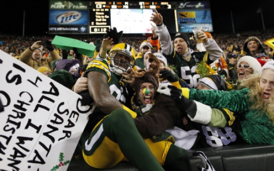 Rodgers, Packers lock up top seed