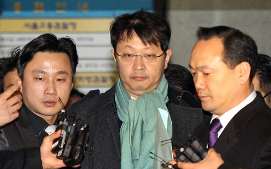 SK vice chairman arrested on embezzlement charges