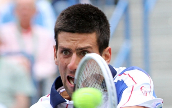 Djokovic steps up to dominate