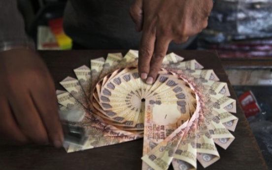 Japan, India seal $15b currency deal