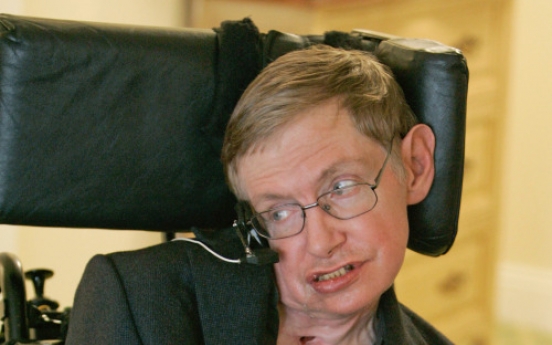 Hawking defies science to celebrate 70th birthday