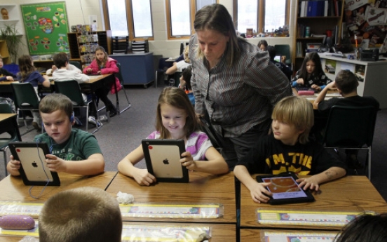 Students learn with donated iPads